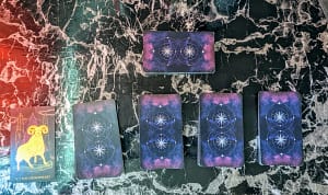 Tarot cards set up to start the solo tarot journaling RPG, Anamnesis
